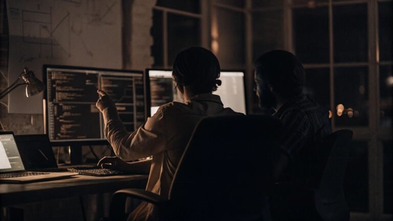 two-people-working-on-the-machine-learning