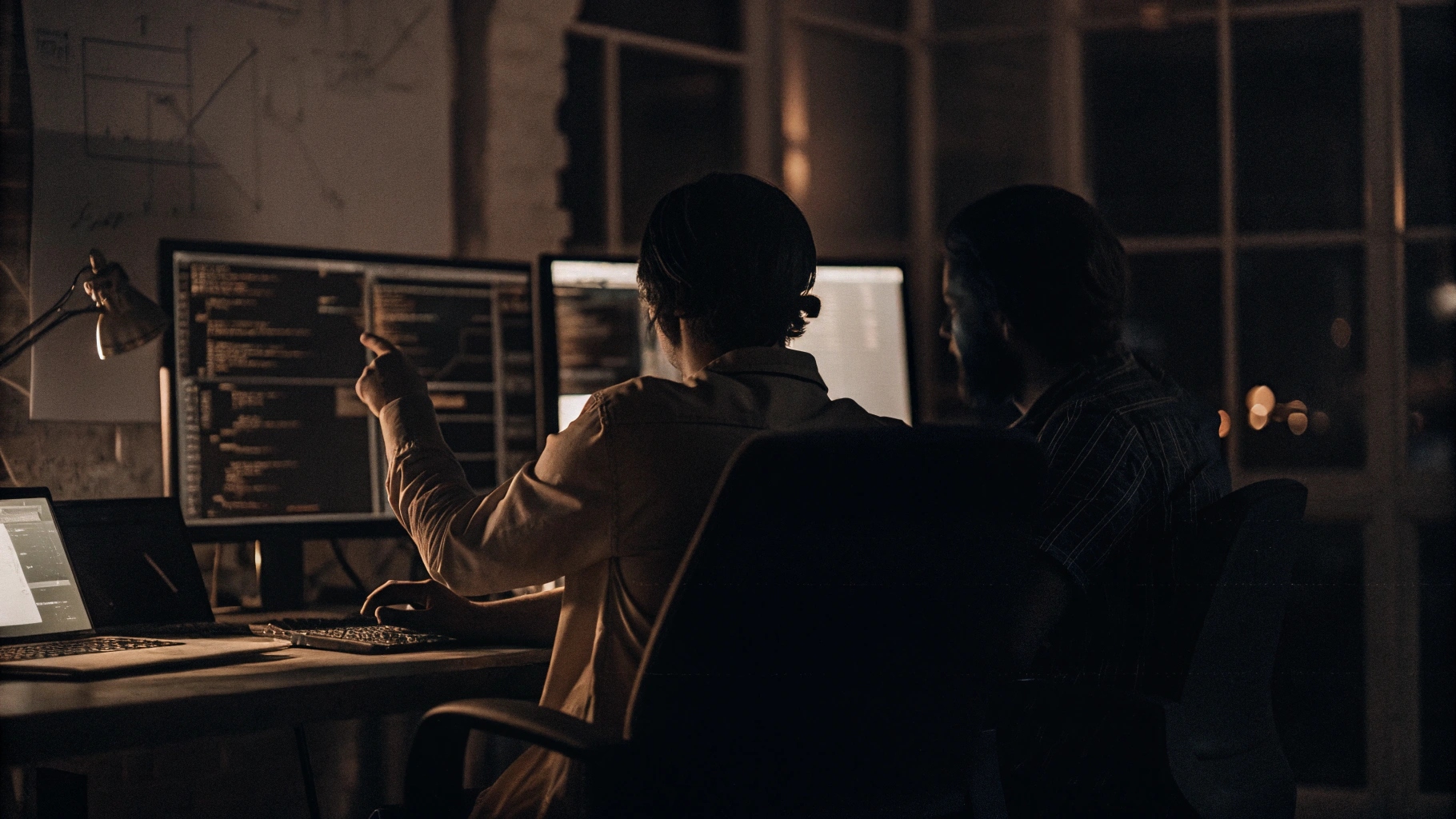 two-people-working-on-the-machine-learning